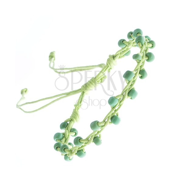 Narukvica od zelene špagice ukrašena perlicama