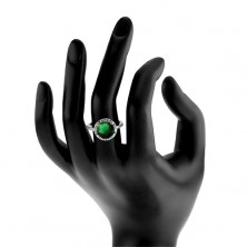 Prsten izrađen od 925 srebra, okrugli cirkon smaragdne boje, rubna linija s cirkonima