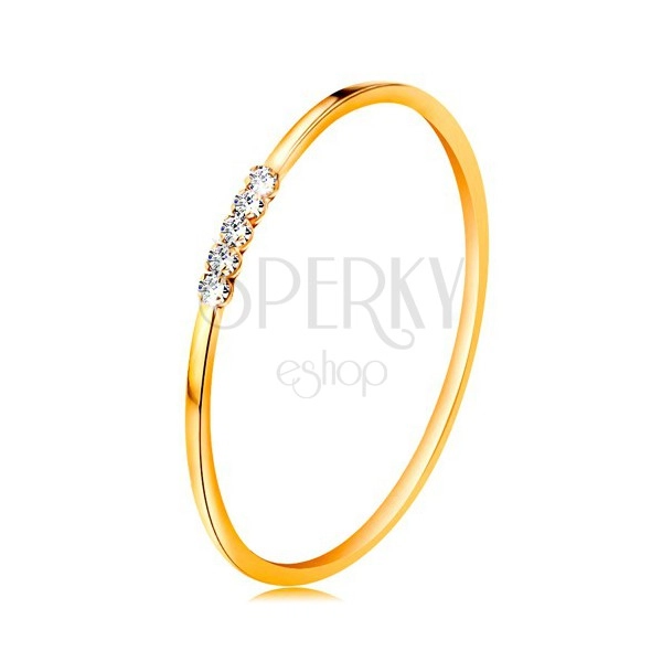 Prsten od 14 karatnog žutog zlata - linija prozirnih cirkona, tanki sjajni krakovi