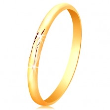 Prsten od žutog 14 karatnog zlata, glatka, sjajna i neznanto ispupčena površina