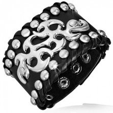 Studded bracelet made of leather with huge tribal design